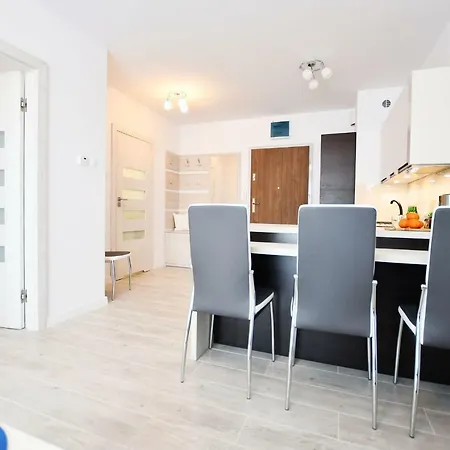 Апартаменты Apartament Blekitne Wybrzeze- Z Garazem Колобжег