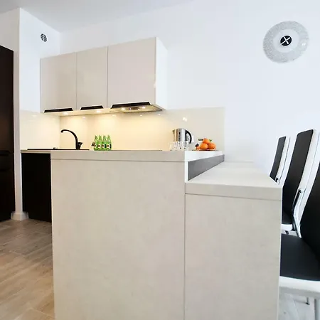Апартаменты Apartament Blekitne Wybrzeze- Z Garazem Колобжег