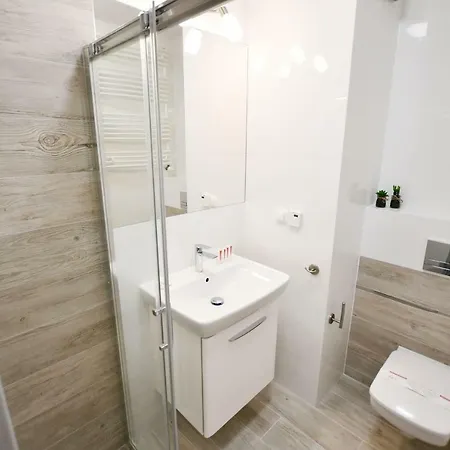 Апартаменты Apartament Blekitne Wybrzeze- Z Garazem